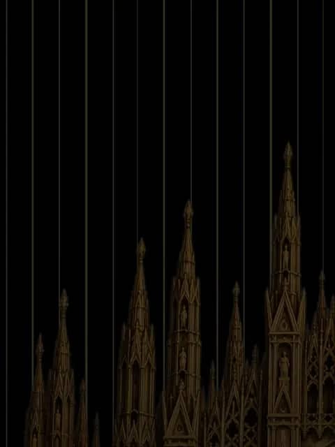 Gold Duomo di Milano spires against black pinstripes